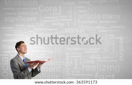 Businessman with opened book