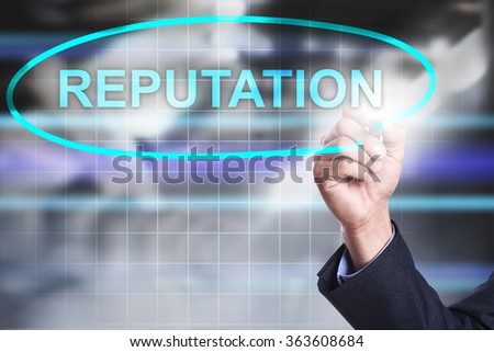 Businessman drawing on virtual screen text "Reputation". Business concept. Internet concept.