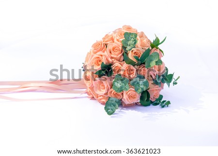 picture of a wedding bouquet , Wedding bouquet of roses lying on white background (light nature)