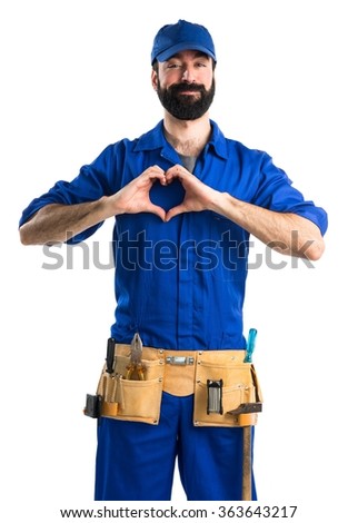 Plumber making a heart with his hands