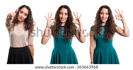 Teenager girl making OK sign