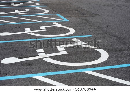 handicap sign on the road surface