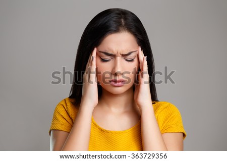 Stress and Headache. Young Woman having Migraine Pain Royalty-Free Stock Photo #363729356