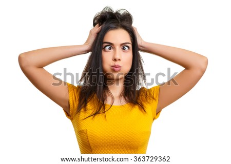 Silly woman making funny face and squinting eyes Royalty-Free Stock Photo #363729362