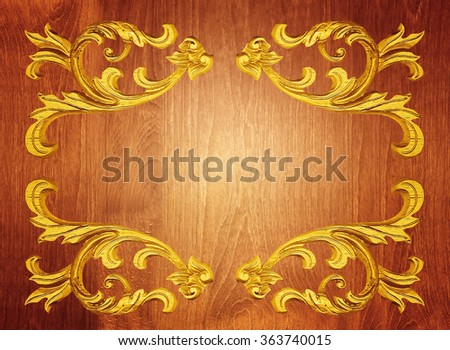 Pattern of wood carve flower on wood background.