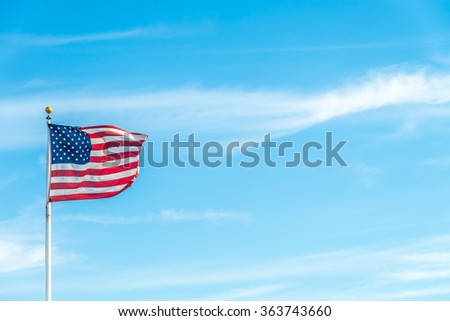 United States of America flag with blue sky