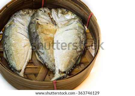 Thai mackerel fish steamed on bamboo basket on white background; Pla-too is name have been called in Thai language.