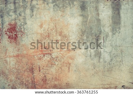 Pastel colored peeled concrete surface. Vintage effect.