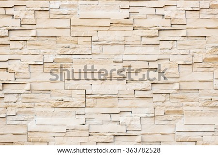 Pattern from lite brown decorative slate stone wall surface. For use as background Royalty-Free Stock Photo #363782528