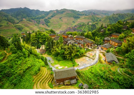Village on Yaoshan Mountain in Guangxi, China. Royalty-Free Stock Photo #363802985