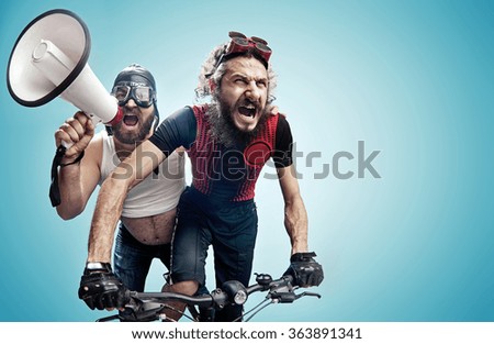 Two nerdy guys with a megaphone