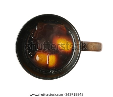 Mug filled with mulled wine isolated