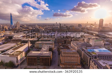 Panoramic skyline view of south London from the top of St.Paul's Cathedral at sunset with blue sky and clouds and River Thames - London, UK