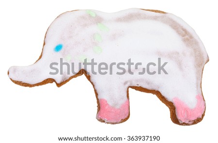 homemade Christmas festive glazed gingerbread cookie - elephant figure cookie isolated on white background