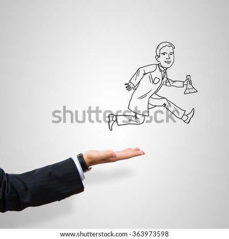 Caricatures of businessman in palm