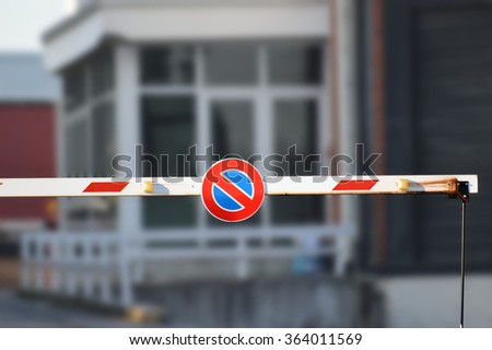 barrier entry of blurred office buildings