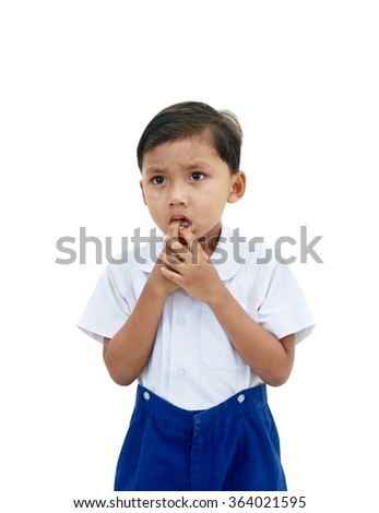 Crying boy in school uniform