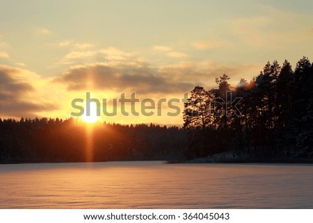Sunset in snow winter