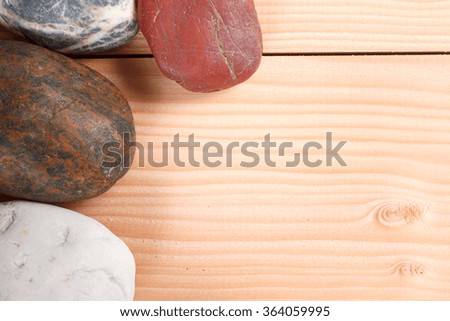 stone zen spa on wooden background 