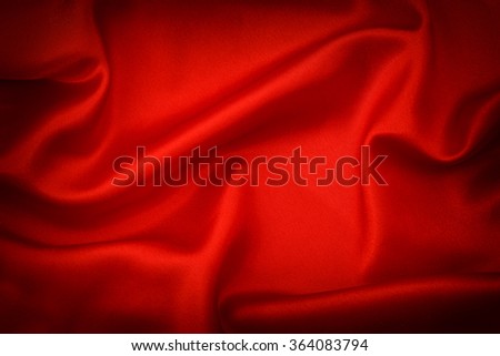 Red silk background. Dark toned with vignette