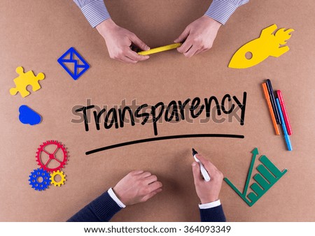 Business Team with a single word Transparency