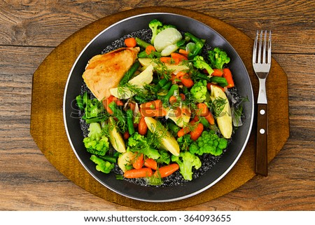 Steamed Vegetables Potatoes, Carrots, Corn, Green Beans, Onion with Chicken Studio Photo