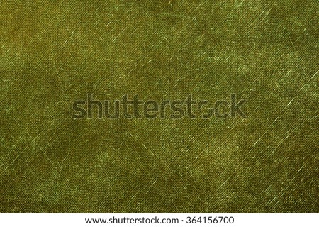 Green canvas texture background.