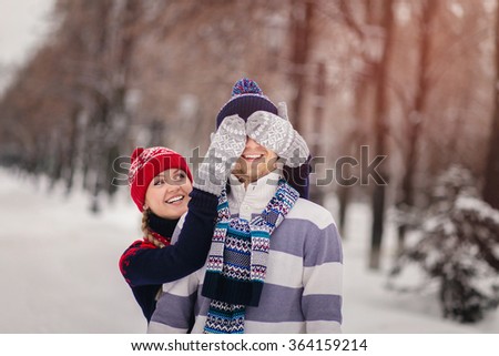 bright picture of family couple in a wool winter clothing.