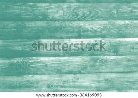 Painted plain green and rustic wood board background. Tinted photo.