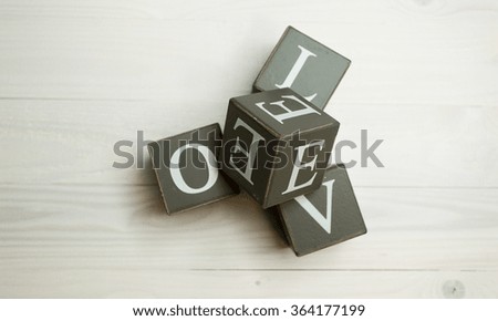 Word love written wooden blocks. Concept of building love