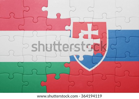 puzzle with the national flag of slovakia and hungary . concept