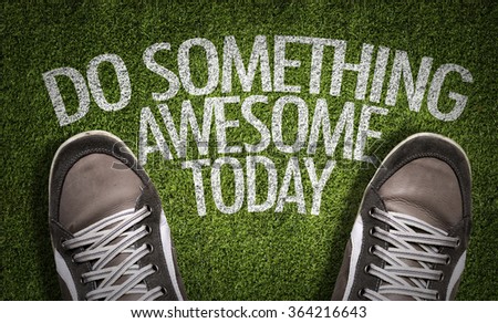 Top View of Sneakers on the grass with the text: Do Something Awesome Today