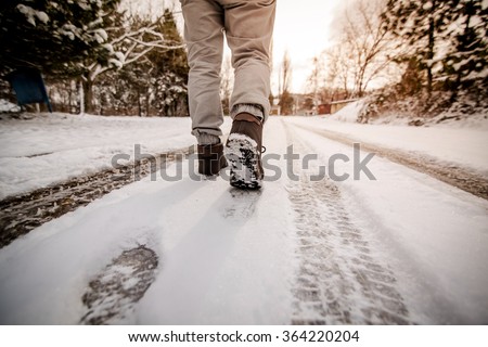 walking in the snow Royalty-Free Stock Photo #364220204