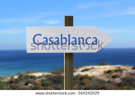 Casablanca sign with seashore in the background