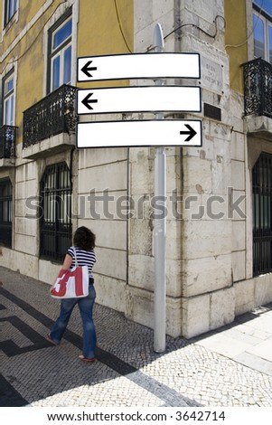 blank direction billboard with people walking