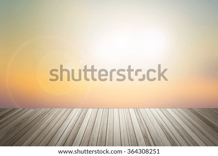 Wooden terrace the blurred and Christmas concept.  Wood white table top in front of natural in the forest sky or mountain blur background image for product display montage.