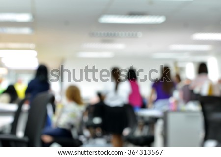 Blurred image of employees attend a weekly meeting every monday morning