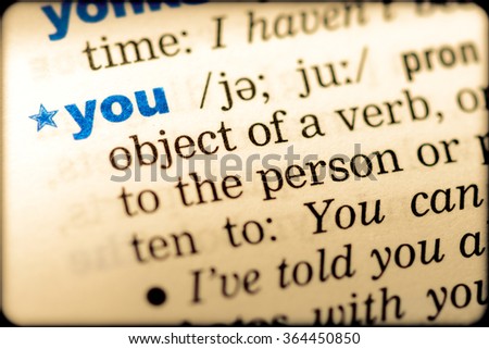 Close-up of word in English dictionary. You, definition and transcription