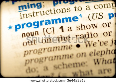 Close-up of word in English dictionary. Programme, definition and transcription