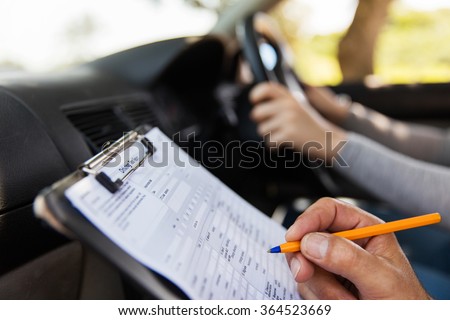 student driver taking driving test Royalty-Free Stock Photo #364523669