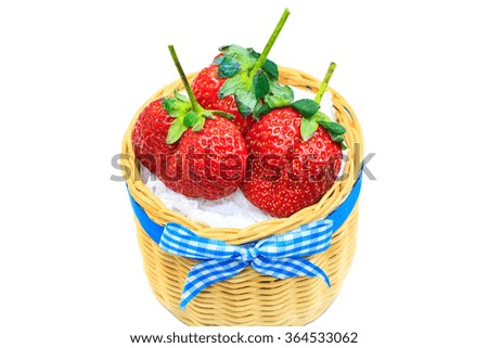 Strawberries in a basket. Isolated on white background.