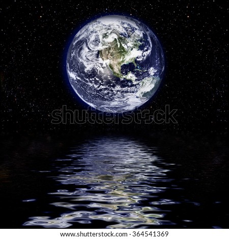 Earth globe over the sea. Elements of this image furnished by NASA