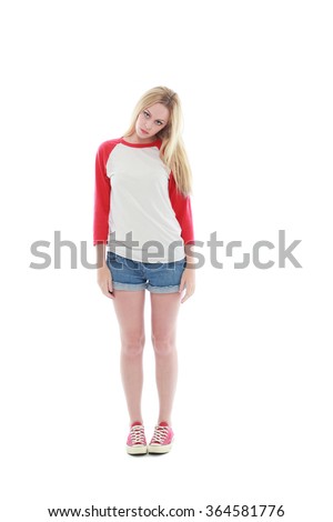 pretty caucasian girl with long blonde hair, wearing casual shirt, shorts and sneakers. standing pose against a isolated white background.