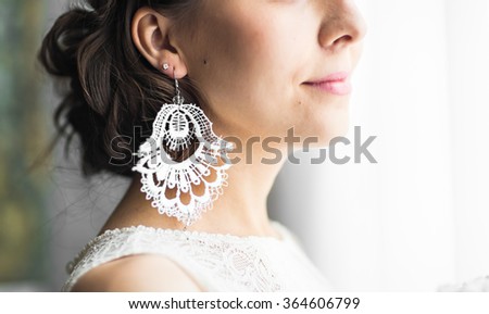 earring in the ear  Royalty-Free Stock Photo #364606799