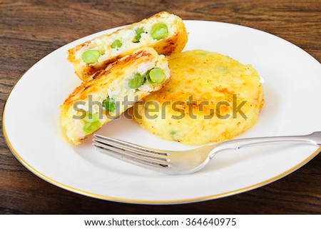 Cheesecake with Green Peas and Eggs. Studio Photo