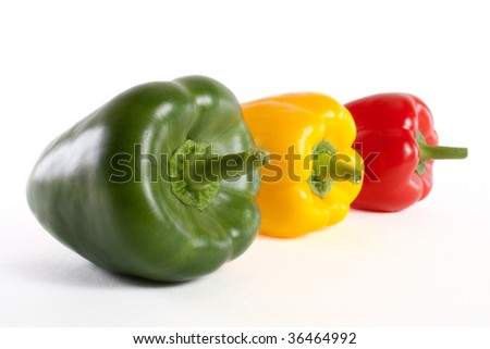  green red and yellow fresh pepper isolated on white background