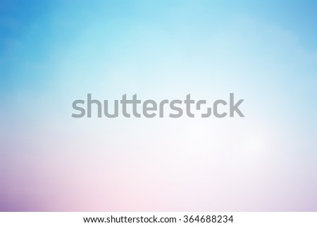 blurred beautiful pastel colorful of natural landscape background with ray lens flare light concept.