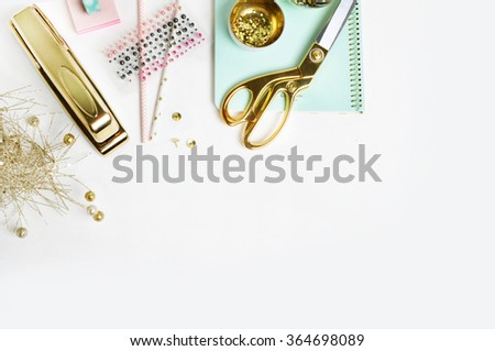 Flat lay. White Desktop. Header website or Hero website, Mock up product view table gold accessories. stationery supplies. glamour style. Gold stapler. .
