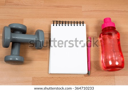 Fitness Equipment and Planning Notebook.