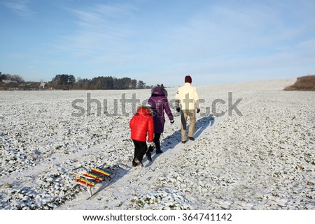 Family walking in winter. Family take a walk on winter